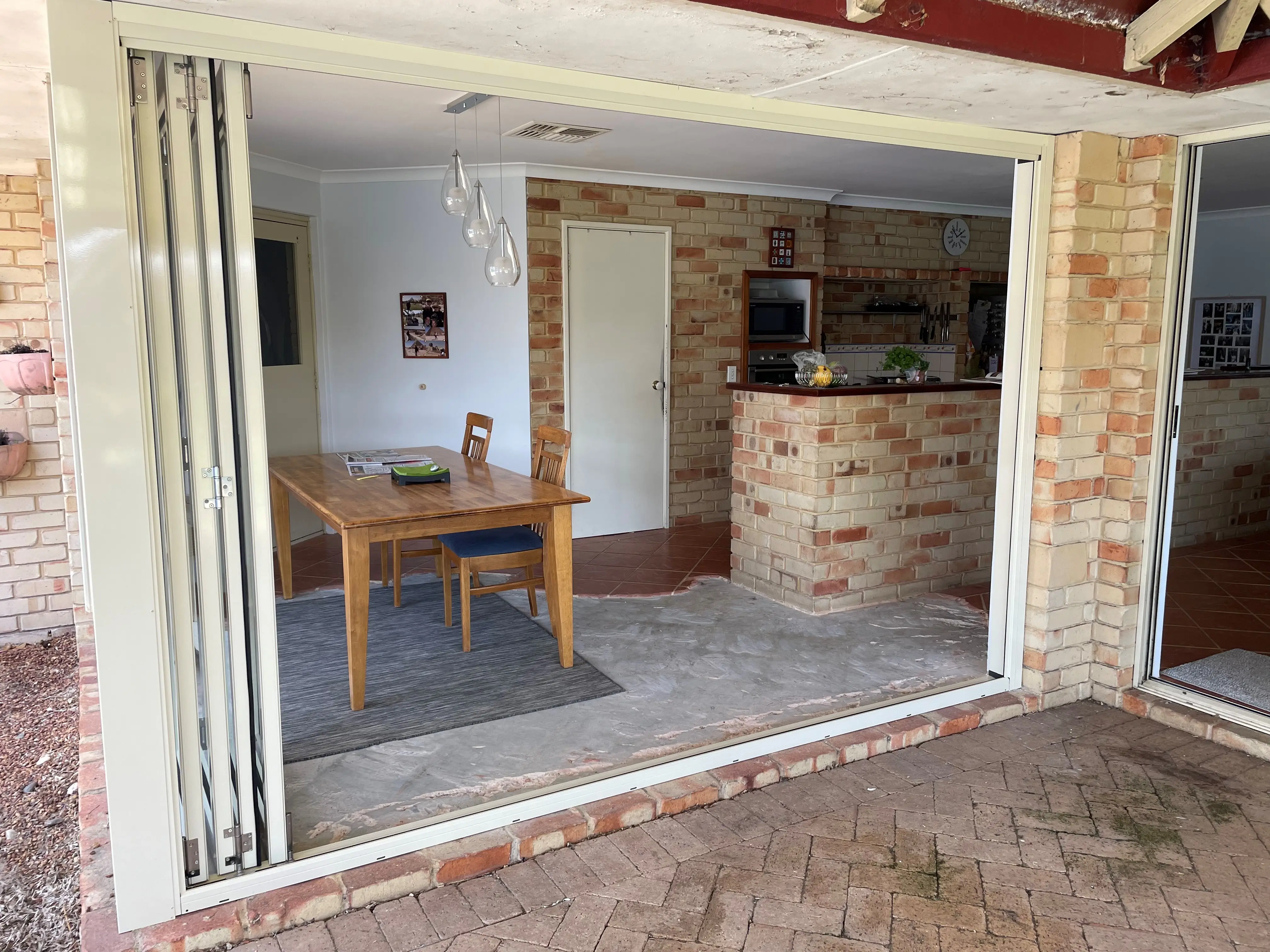 Bifold door installation guide in white