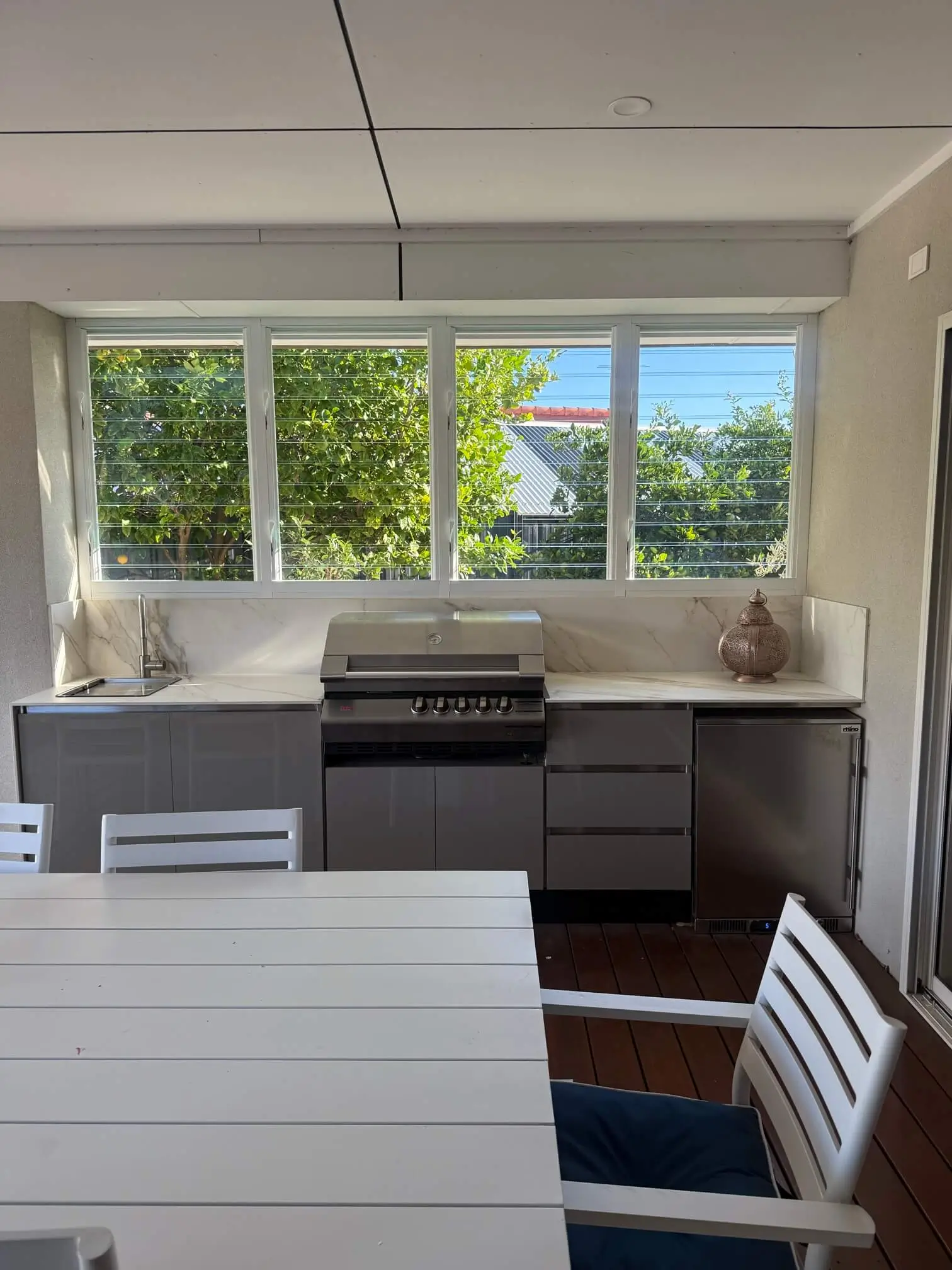 Security and insect screens for louvre windows