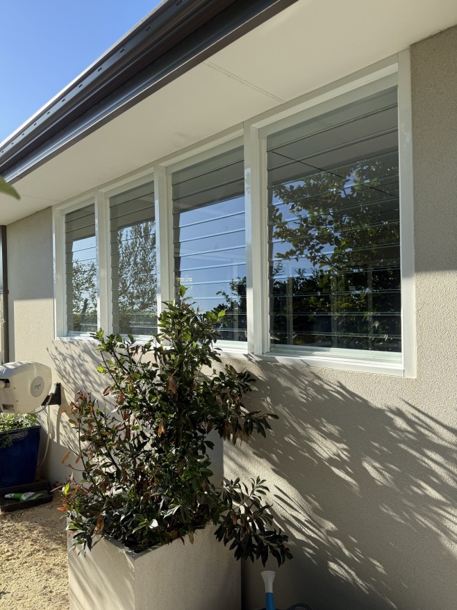 Louvre window installed in an enclosed patio area in a home in Leeming.