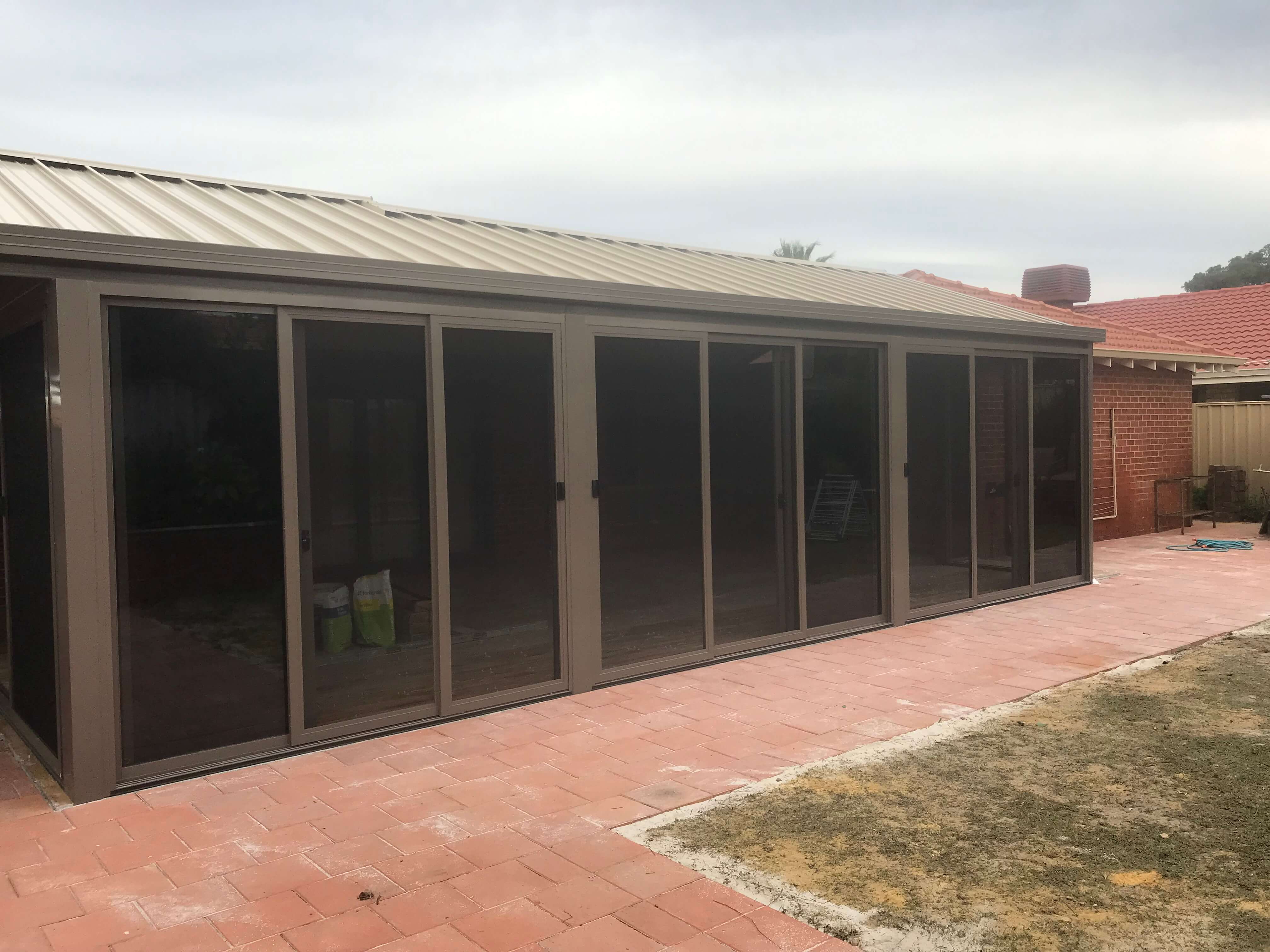 3 Panel STACKING DOOR W FLYSCREENS Patio Enclosure.jpeg
