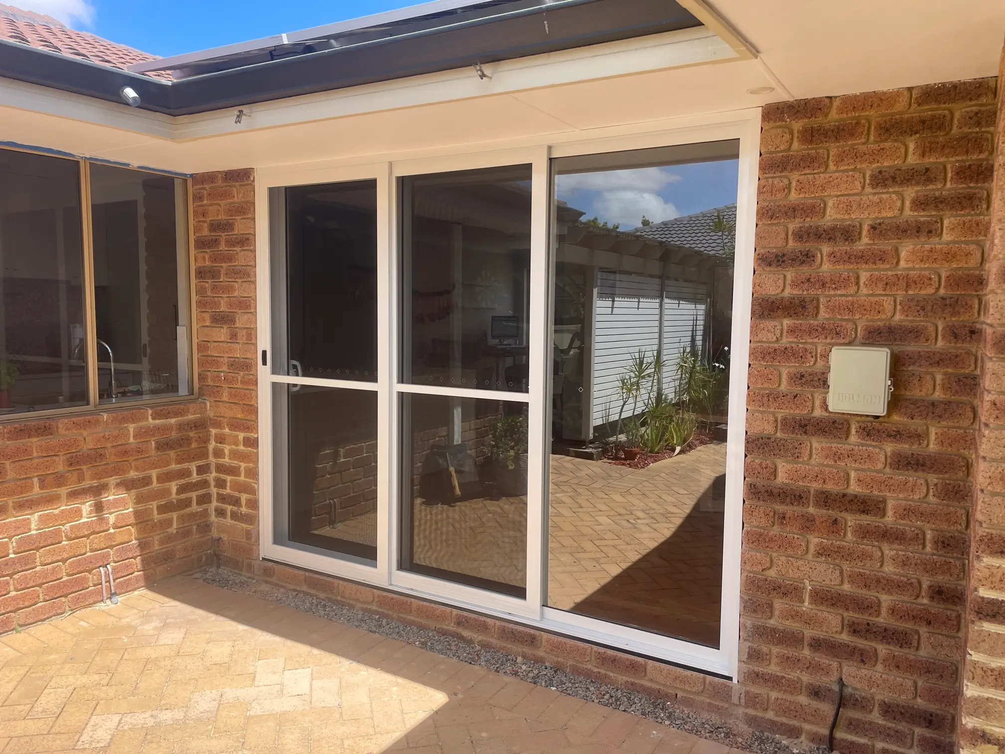 LEEMING SLIDING STACKING DOOR AFTER 1.