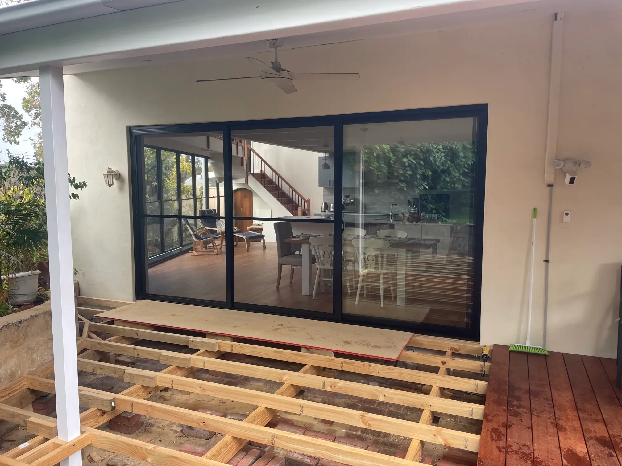 MELVILLE SLIDING STACKING DOOR AFTER.